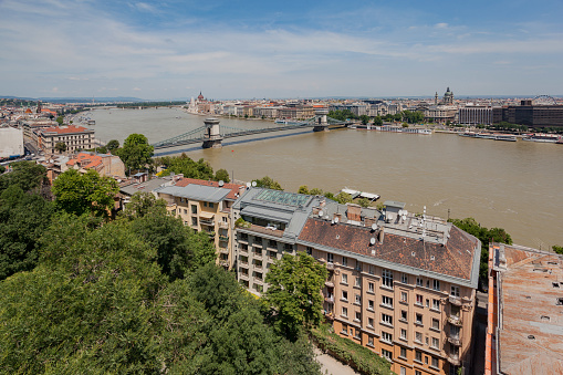 The chain bridge, the St Stephen Basilica and the Historical buildings in Budapest, Hungary