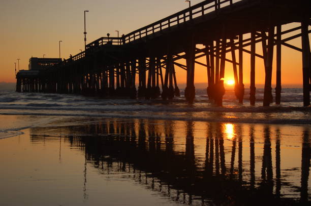 istock Pier on the sea at sunset 1943632434