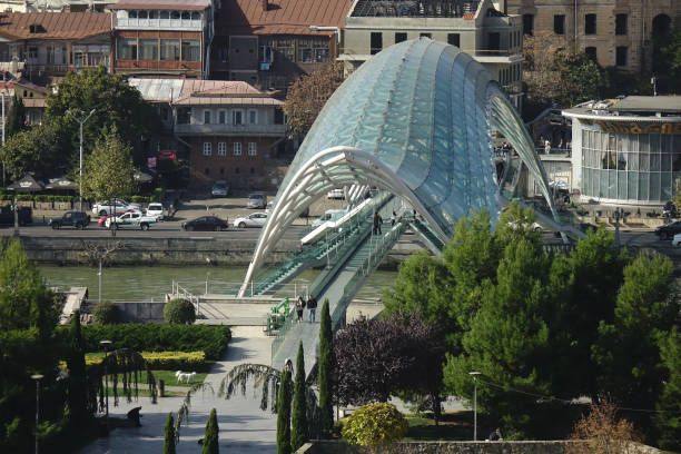 November 6, 2023, Tbilisi, Georgia, trendy symbol landmark, beautiful deformed green Peace Bridge