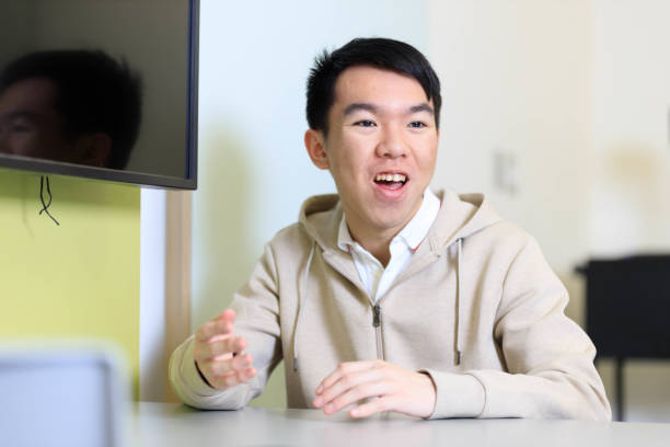 istock Young college student participating in an enthusiastic discussion in class 1943727497