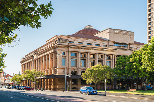 Adelaide, Australia - December 19, 2020: Sir Samuel Way Courts Building as the main seat of the District Court of South Australia on Victoria Square viewed from Gouger street on a day