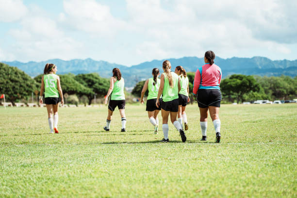 istock Group of female athletes playing a soccer game 1943833208