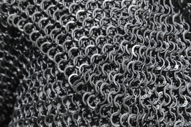 istock Medieval knight torso armor made of linked iron rings 1943834274