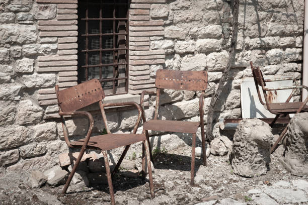 A row of wood vintage chairs and tables or a restaurant