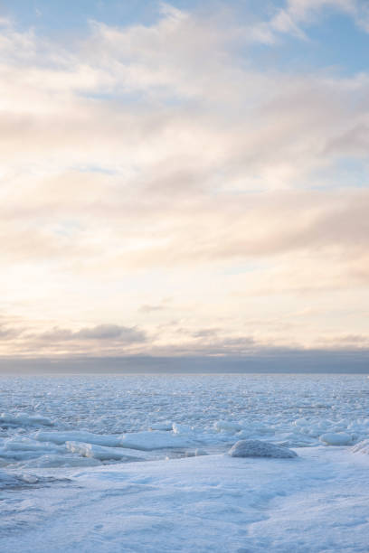 istock A stone on a snowy seashore 1943961096