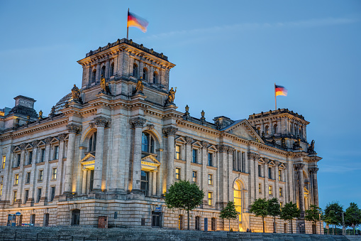 The imposing Reichstag in Berlin, the german parliament building, at dusk