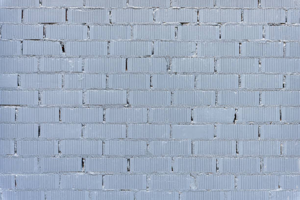 Background from a wall made of gray painted bricks