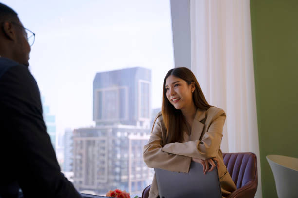 istock White collar workers are meeting at office tower. 1943998137