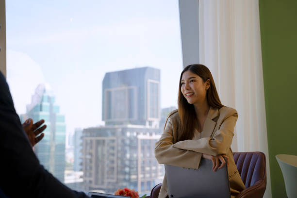 istock White collar workers are meeting at office tower. 1943998139