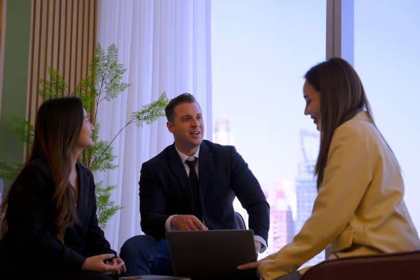istock White collar workers are meeting at office tower. 1943999166
