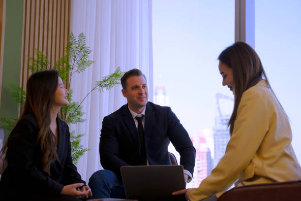 istock White collar workers are meeting at office tower. 1943999169