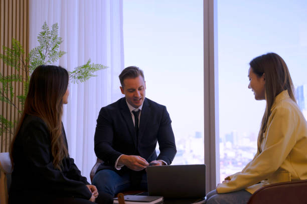 istock White collar workers are meeting at office tower. 1943999544