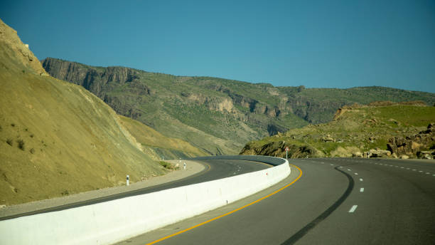 istock a road with a tire mark on the road 1944003813