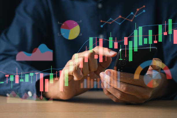 istock Businessman using mobile phone with exponential arrow and financial graph for business investment growth. Financial, data analysis, goal,success and money concept. 1944041123