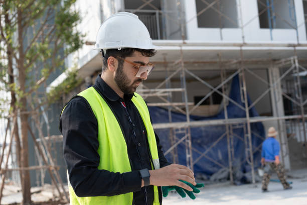 istock Portrait Caucasian engineer man working at construction site 1944052623