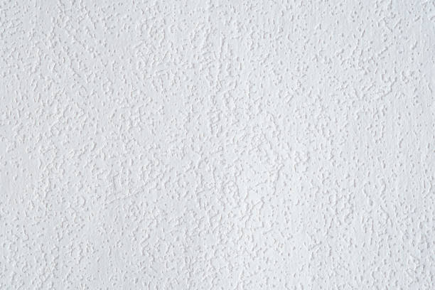 istock white stucco concrete texture wall background detail design backdrop 1944089725
