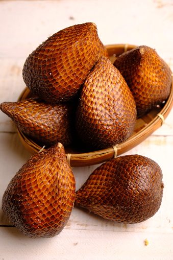 Salak is a type of palm fruit commonly eaten. It is also known as sala. In English it is called salak or snake fruit. Salacca zalacca. This fruit is called a snake fruit. Salak pondoh from Yogyakarta.