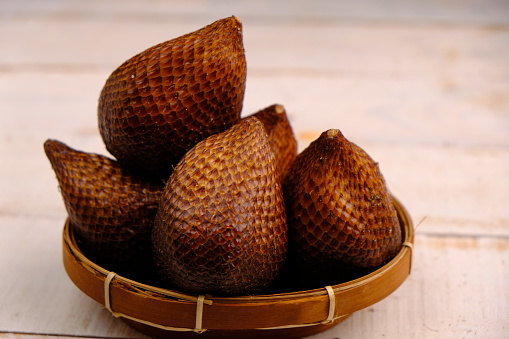 Salak is a type of palm fruit commonly eaten. It is also known as sala. In English it is called salak or snake fruit. Salacca zalacca. This fruit is called a snake fruit. Salak pondoh from Yogyakarta.