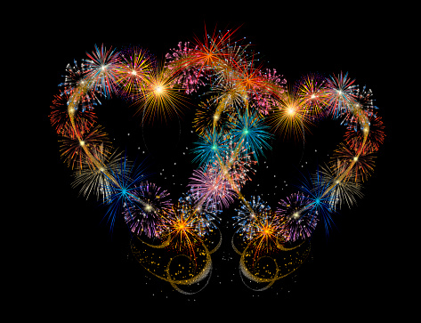 Two hearts made of festive fireworks and salutes on a black background. The 14th of February. Valentine's Day