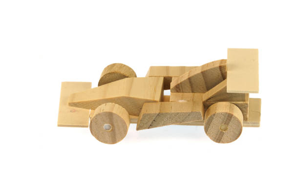 istock wooden race car isolated on white background 1944249045