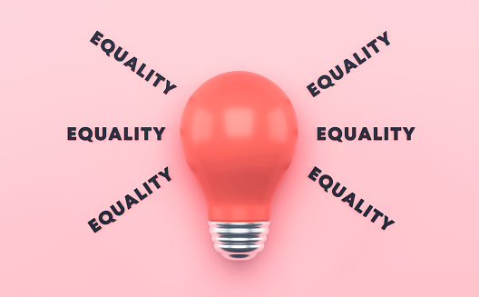 Light Bulb, Equality And International Women’s Day Concept On Pink Background