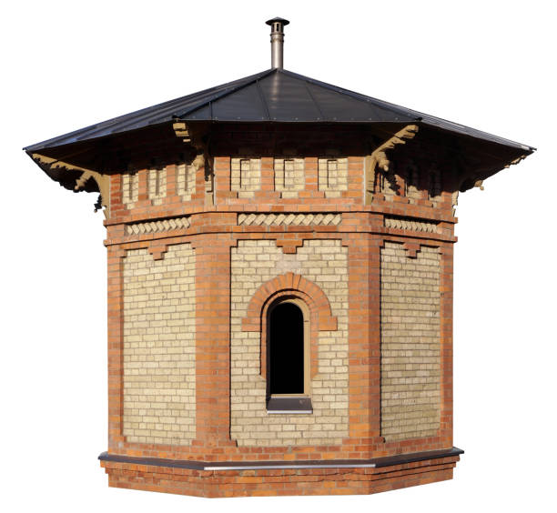 The old well is protected from the weather by a brick shed. Isolated on white