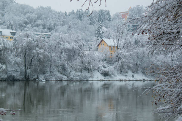 istock A cozy cabin in a snowy forest. 1944427100