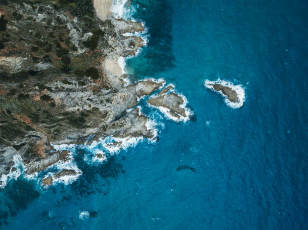 istock Overhead view of the cliff coast during winter 1944440438