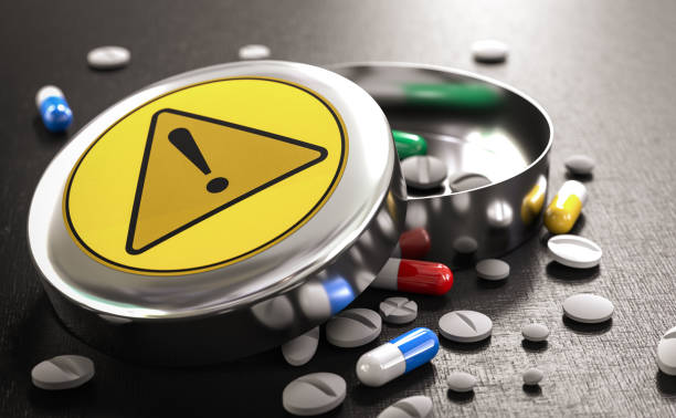 Drug interactions and risks. Adverse effects. stock photo