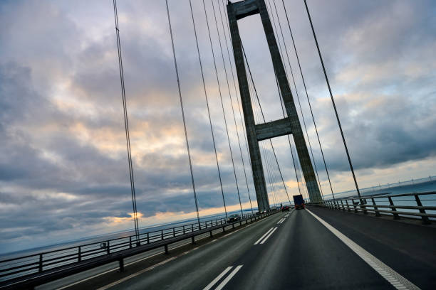 istock Driving on highway on suspension bridge 1944469464