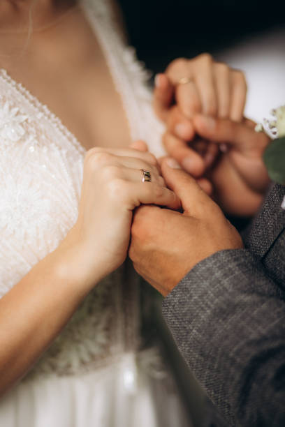 istock Holding Hand Groom And Bride 1944471802