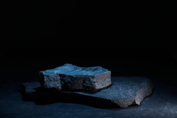 istock Flat stone pedestal in blue neon light template banner background. Minimalism concept, empty podium display product, presentation scene 1944494686