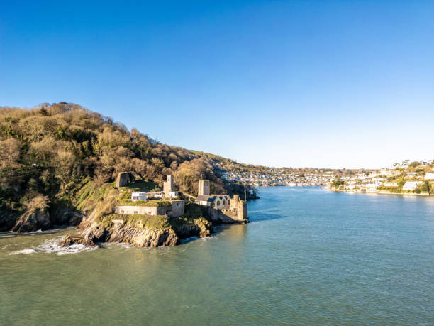 A view of The River Dart and the town of Kingswear, across the water, taken from the waterfront at Dartmouth in the county of Devon in England