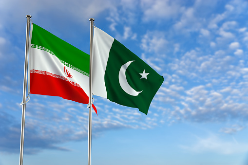 Islamic Republic of Pakistan Flag and Islamic Republic of Iran Flag Over Blue Sky Background. 3D Illustration