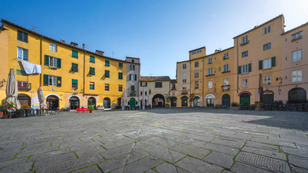 istock Lucca, Piazza dell' Anfiteatro square. Tuscany, Italy 1944523562