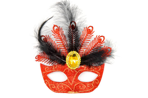 istock Luxurious red masquerade mask with feathers 1944526266