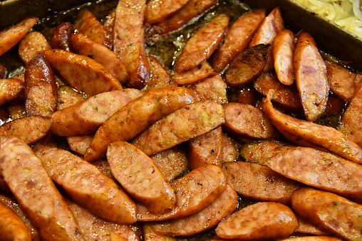 Fried baked sausage top view, delicious food