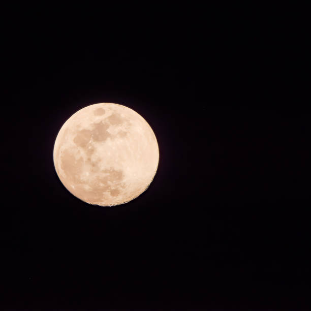 istock Full moon in the dark sky during night time, Great super moon in sky 1944544761