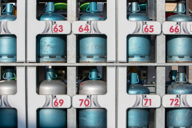 Blue gas bottle container in a store stock photo