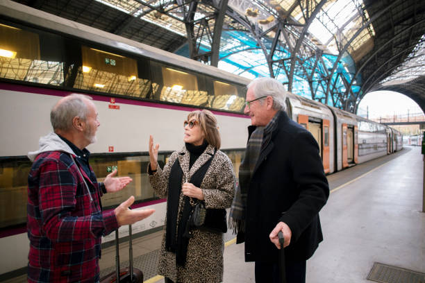 istock Senior friends at the train station 1944587064