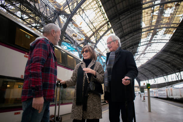 istock Senior friends at the train station 1944588676