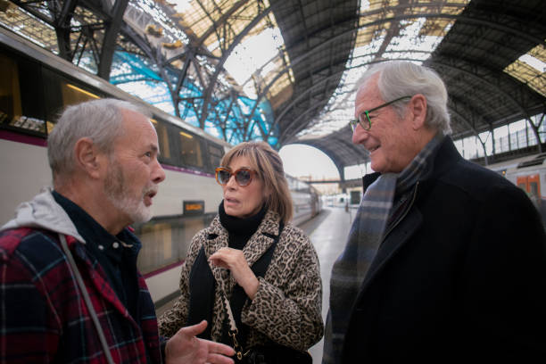 istock Senior friends at the train station 1944588679