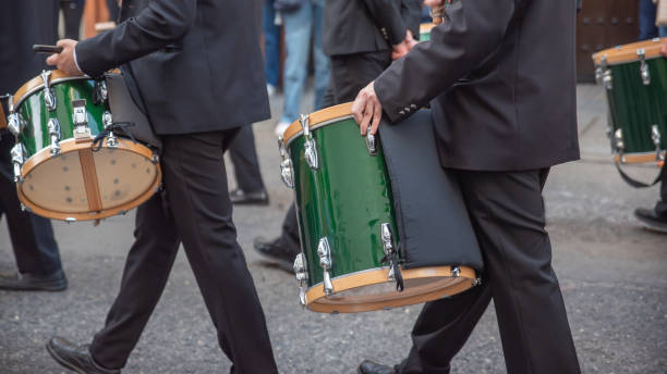 istock Drum parade playing music in the streets 1944592356