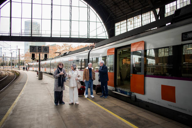 istock Senior friend at the train station 1944609404
