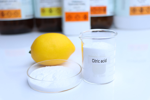 Citric acid in chemical container , chemical in the laboratory and industry, Raw materials used in production or analysis