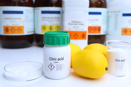 Citric acid in chemical container , chemical in the laboratory and industry, Raw materials used in production or analysis