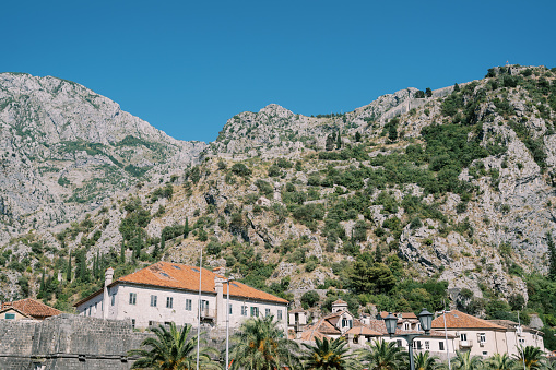 Church of Our Lady of Remedy near rocky mountain. Kotor, Montenegro. High quality photo