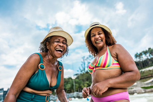 Portrait of mother and daughter at water park