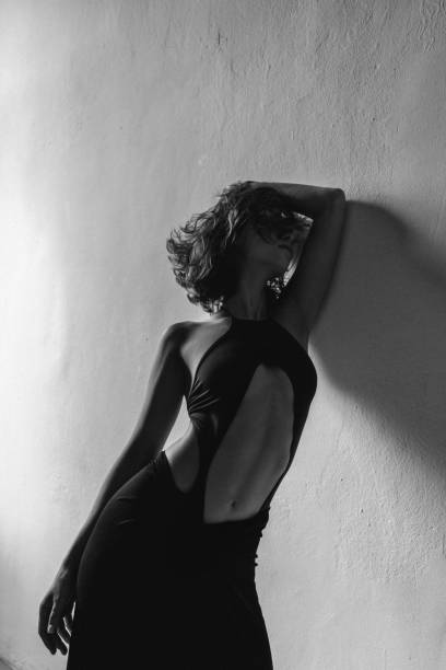 istock Beautiful woman posing at the studio 1944677030