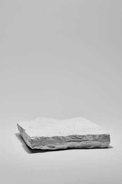 istock Flat stone pedestal, white template, banner background. Minimalism concept, empty podium display product, presentation scene 1944717060